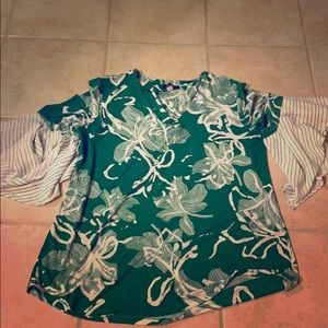 Vneck Tunic with romantic ruffle sleeves.